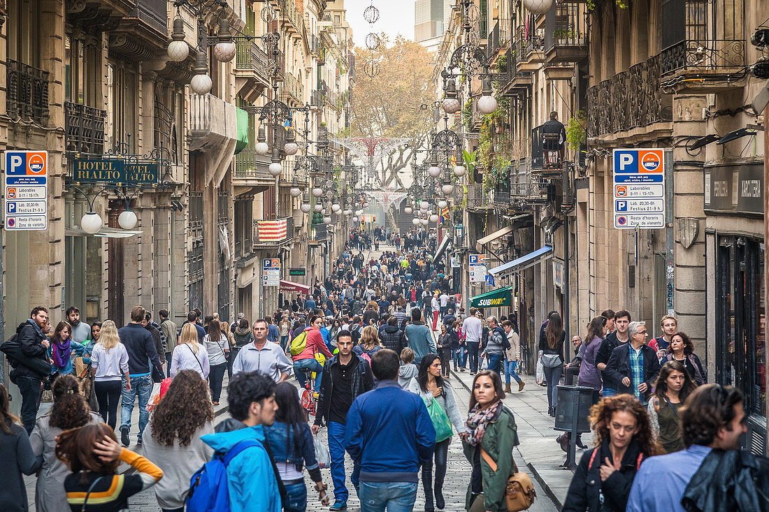 Lots of people in the Gothic Quarter in Barcelona, Spain