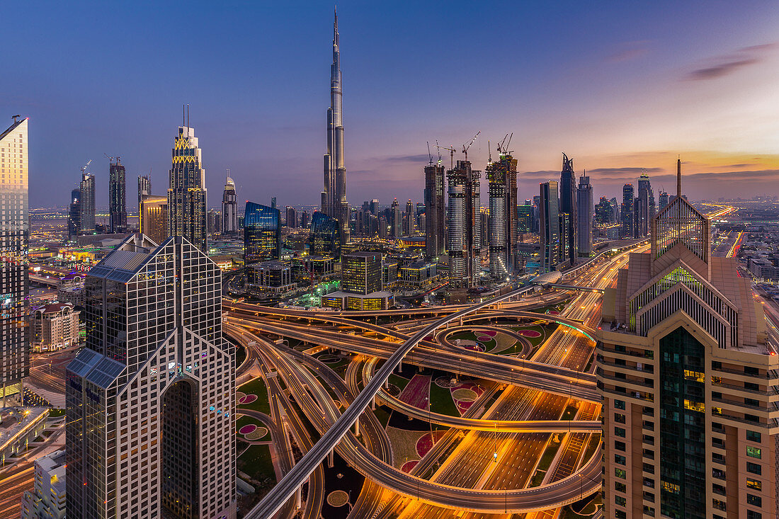 The illuminated city with the Burj Khalifa in Dubai, UAE