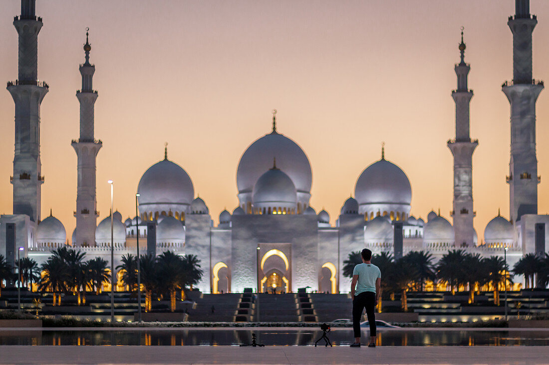 Photographer in front of the Sheikh Zayed Mosque in Abu Dhabi, UAE