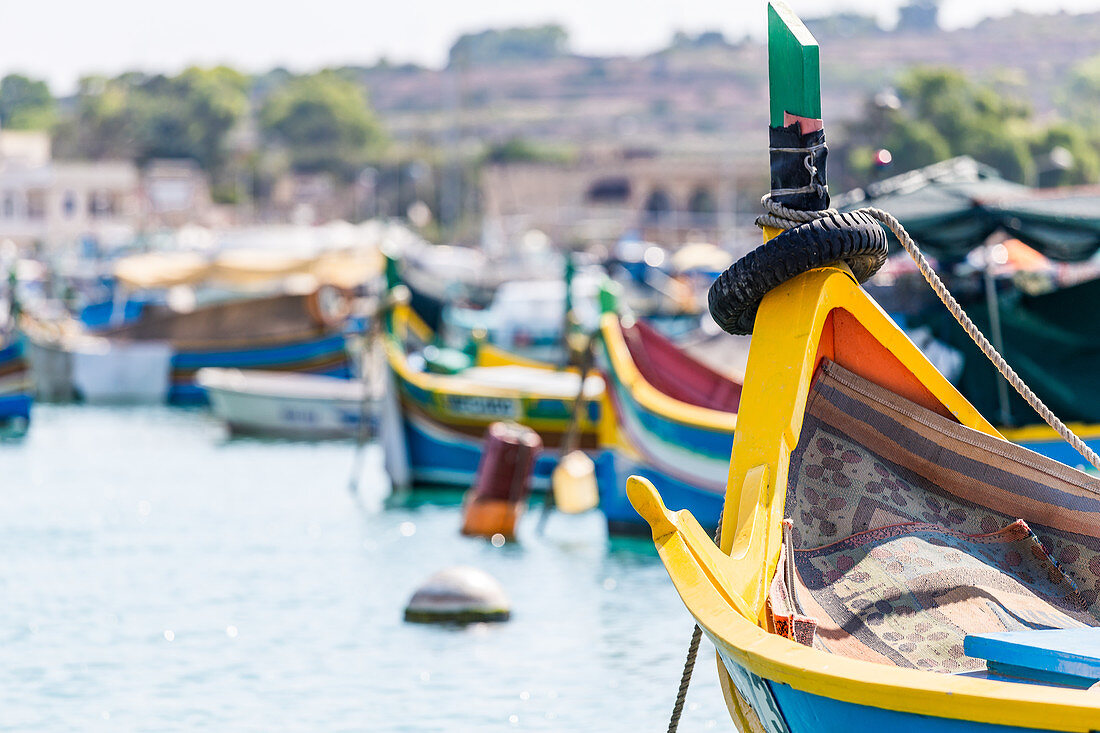 The famous Luzzus in the port city of Marsaxlokk in Malta