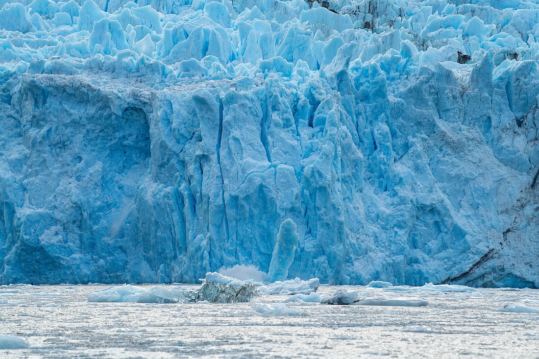 Detail of the front wall of the glacier with chunks of ice in the water, Garibaldi Glacier, near Beagle Channel, Alberto de Agostini National Park, Magallanes y de la Antartica Chilena, Patagonia, Chile, South America