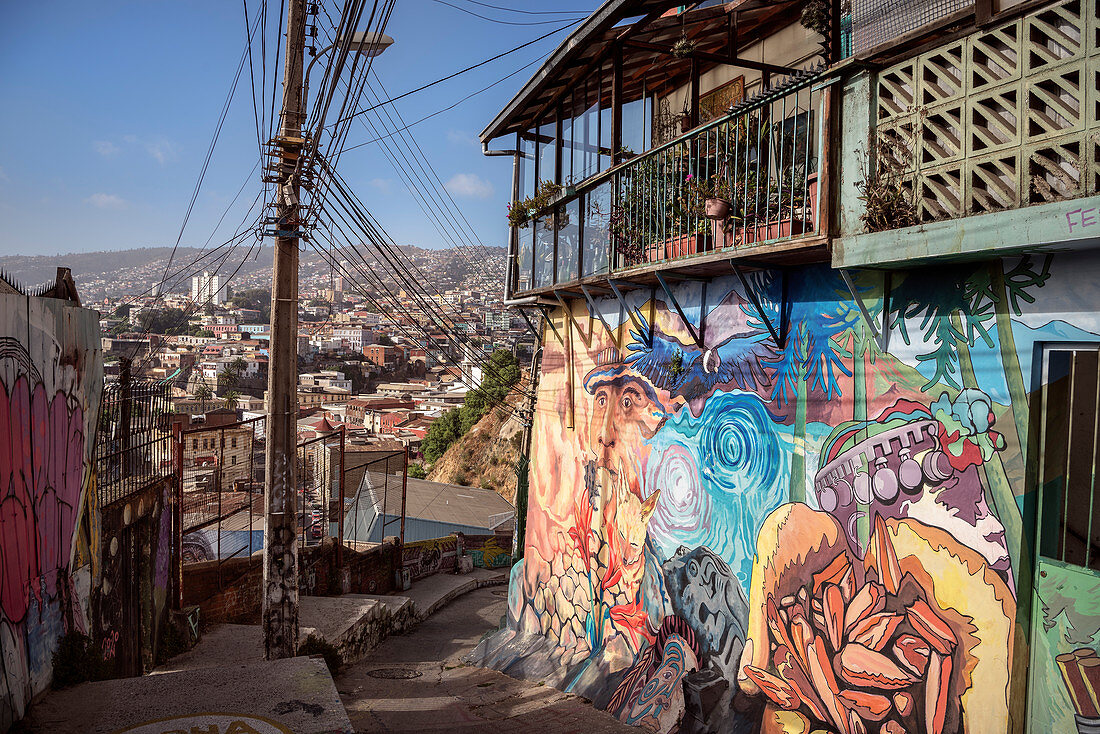 Street art in the streets of Valparaiso, view to the port, Chile, South America