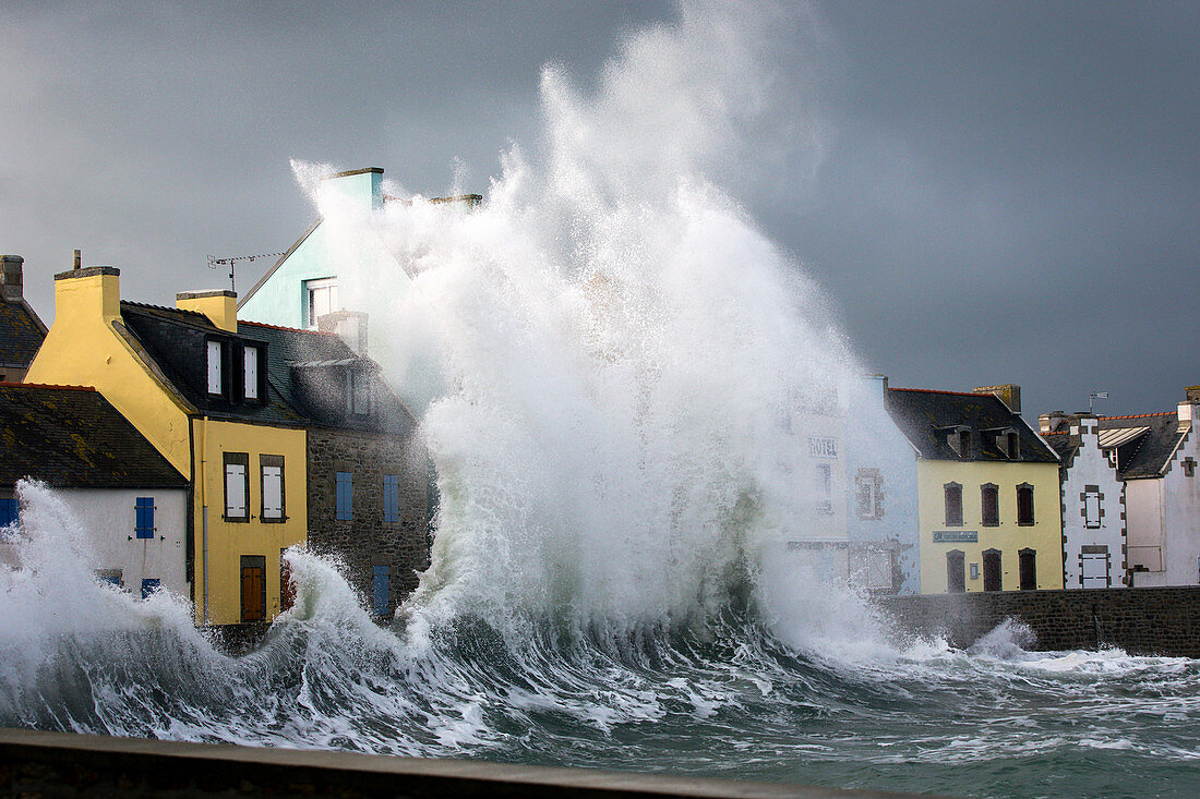 France, Finistere, Iroise Sea, Iles du Ponant, Parc Naturel Regional d'Armorique (Armorica Regional Natural Park), Ile de Sein, labelled Les Plus Beaux de France (The Most Beautiful Village of France), waves in the harbour during a storm at the Quai des Paimpolais