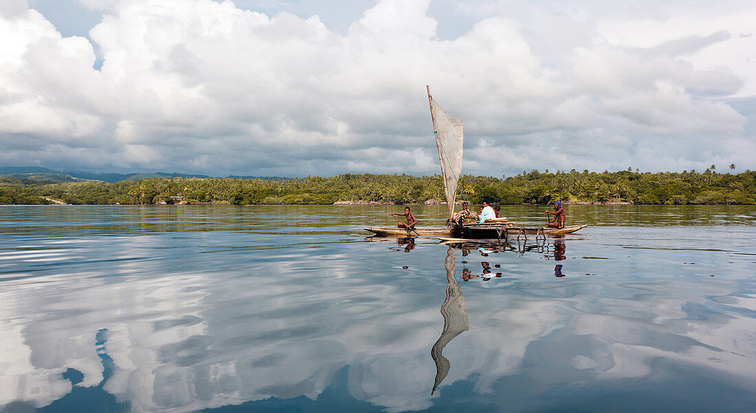 Papua New Guinea - November 8, 2010:  A group of smiling people on a boat.