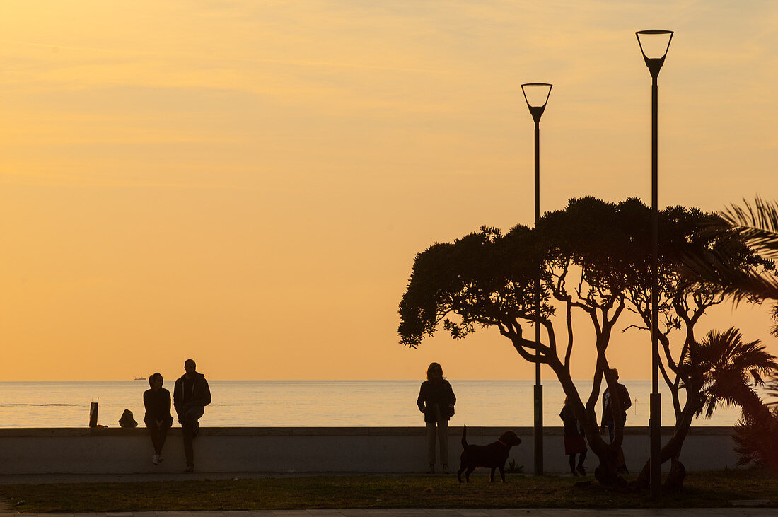 Autumn sunset along the city seafront promenade, socalled Passeggiata