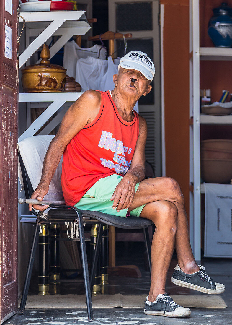 Cuban smokes his cigar in Trinidad, Cuba
