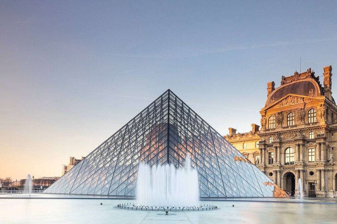 France, Paris, area listed as World Heritage by UNESCO, the Louvre Pyramid of the architect Ieoh Ming Pei, facade of the pavillon of Richelieu in the court Napoleon
