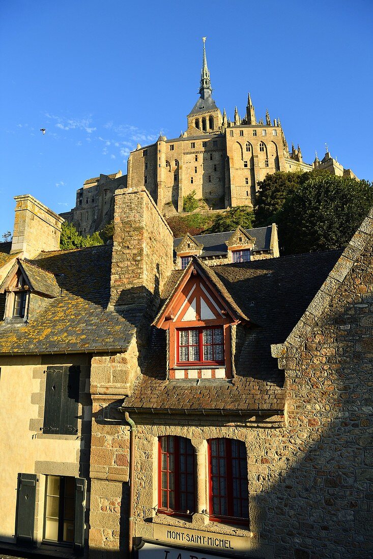 France, Manche, Mont Saint Michel Bay listed as World Heritage by UNESCO, Mont Saint Michel, half timbered houses and abbey church from the fortification walk