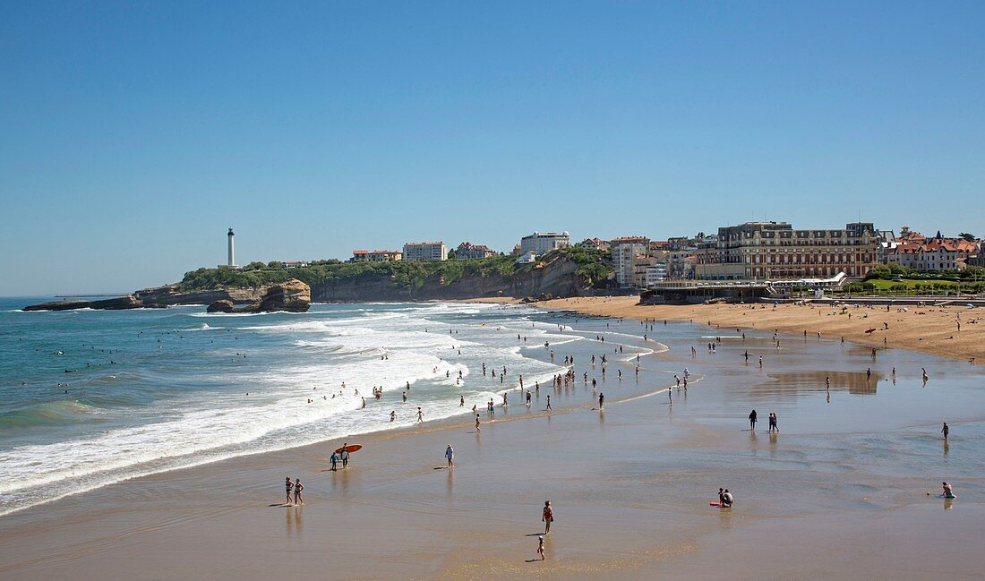 France, Pyrennees Atlantique, Basque Country, Biarritz, Grande Plage with view of the Palais and the lighthouse