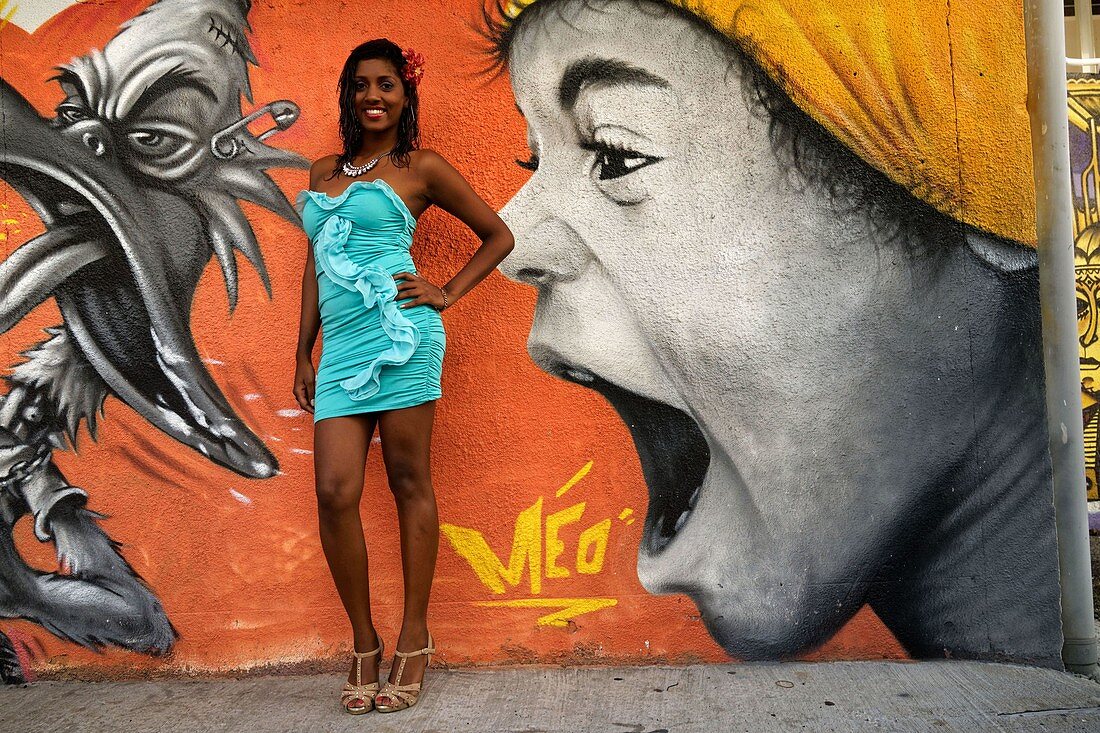 Reunion, Saint Pierre, Theater L. Langenier, A slammer poses in front of a mural