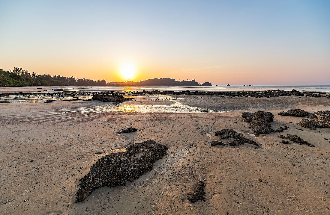 Beach at low tide in Buffalo Bay (Ao Khao Kwai) at sunset, Koh Phayam. Thailand