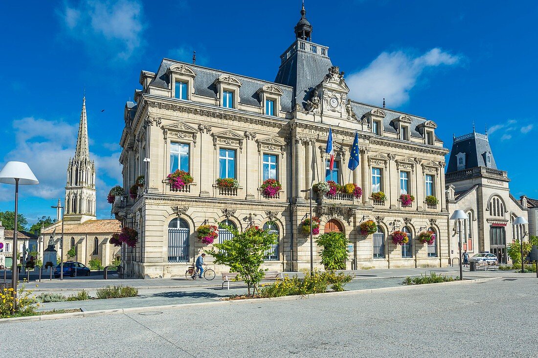 France, Gironde, Coutras, the town hall built in 1888 and the Gothic Saint Jean Baptiste church rebuilt in the 15th century