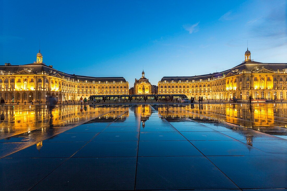 France, Gironde, Bordeaux, area listed as World Heritage by UNESCO, Saint Pierre district, Place de la Bourse, the reflecting pool from 2006 and directed by Jean-Max Llorca hydrant, football game