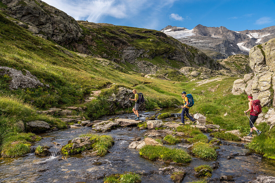 Crossing the stream in the Randinascia, 3rd day stage Trekking del Laghetti Alpini, Ticino, Switzerland