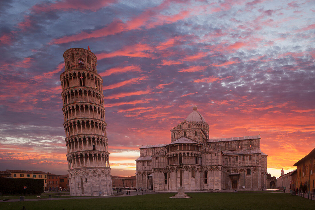 Leaning Tower of Pisa and Piazza dei Miracoli at sunset in Tuscany, Italy