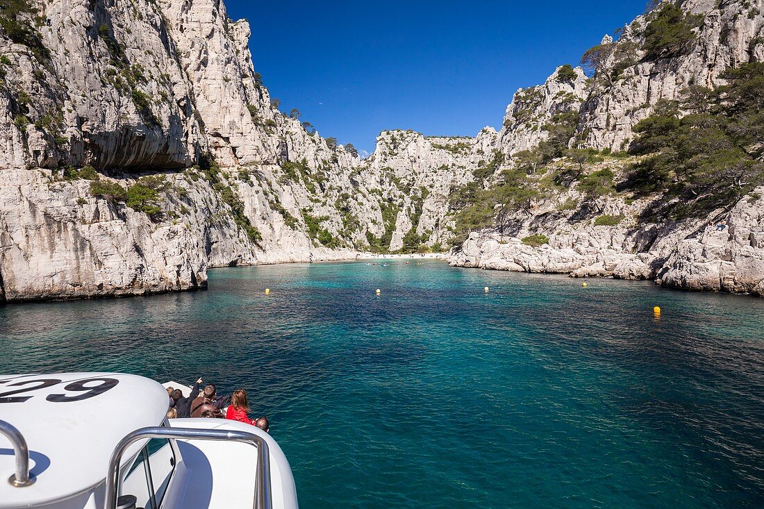 France, Bouches-du-Rhône, Marseille, National park of Calanques, tourist boat in the creek of En-Vau