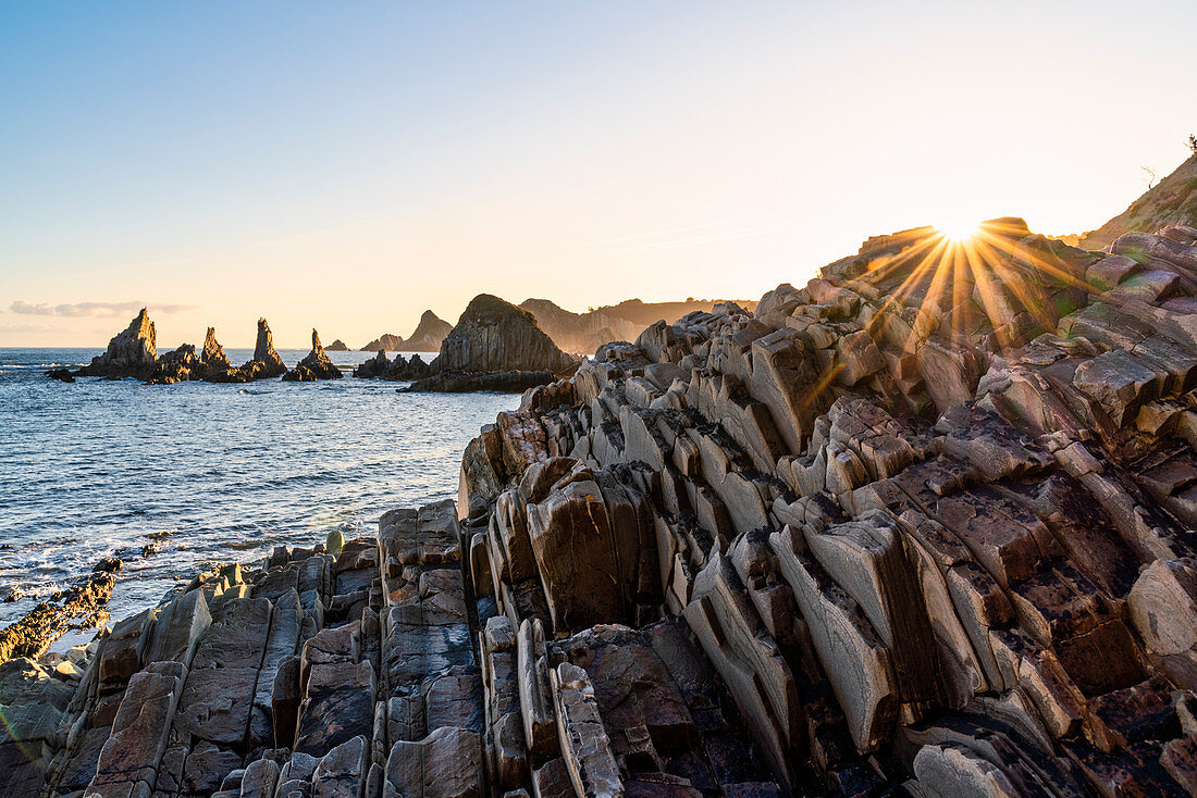 Playa Gueirua, Santa Marina, Asturias, Spain. La Forcada (The Pitchfork) sea stacks at sunrise