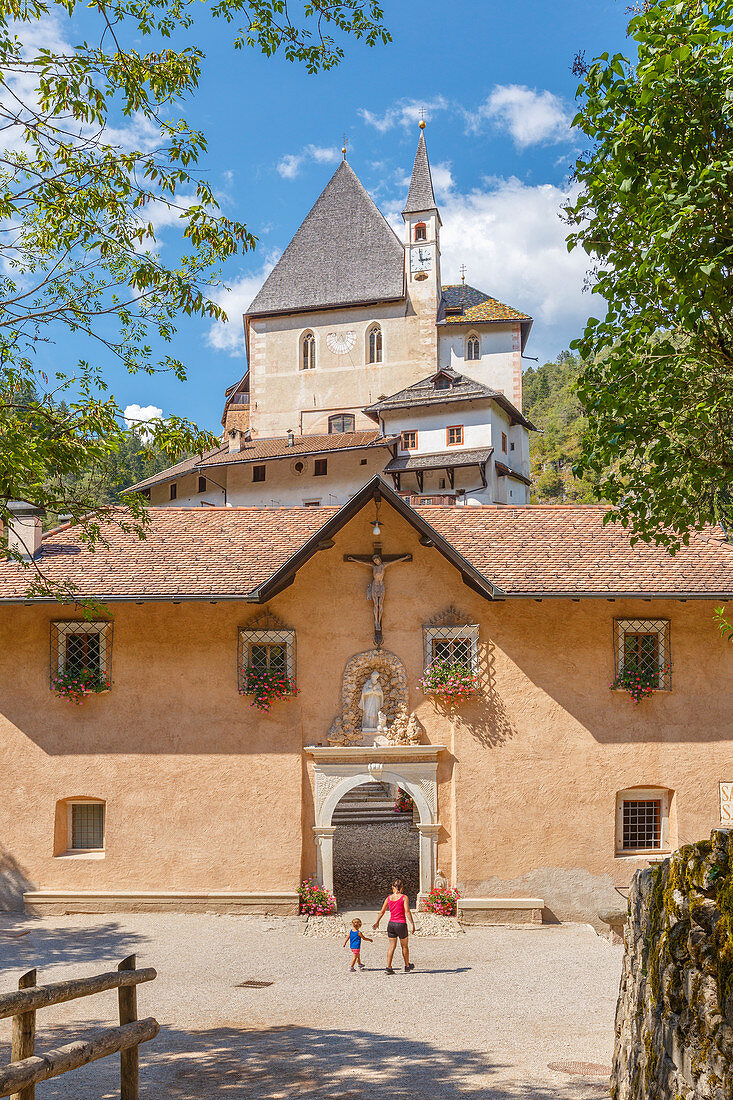 Mom and son visits San Romedio monastery, Sanzeno, Predaia, Non valley, Trento province, Trentino Alto Adige, Italy, Europe (MR)