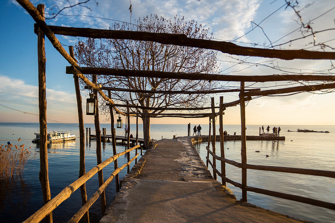 Punta San Vigilio, Verona province, Veneto, Italy, Europe. Old wooden trellis on the dock