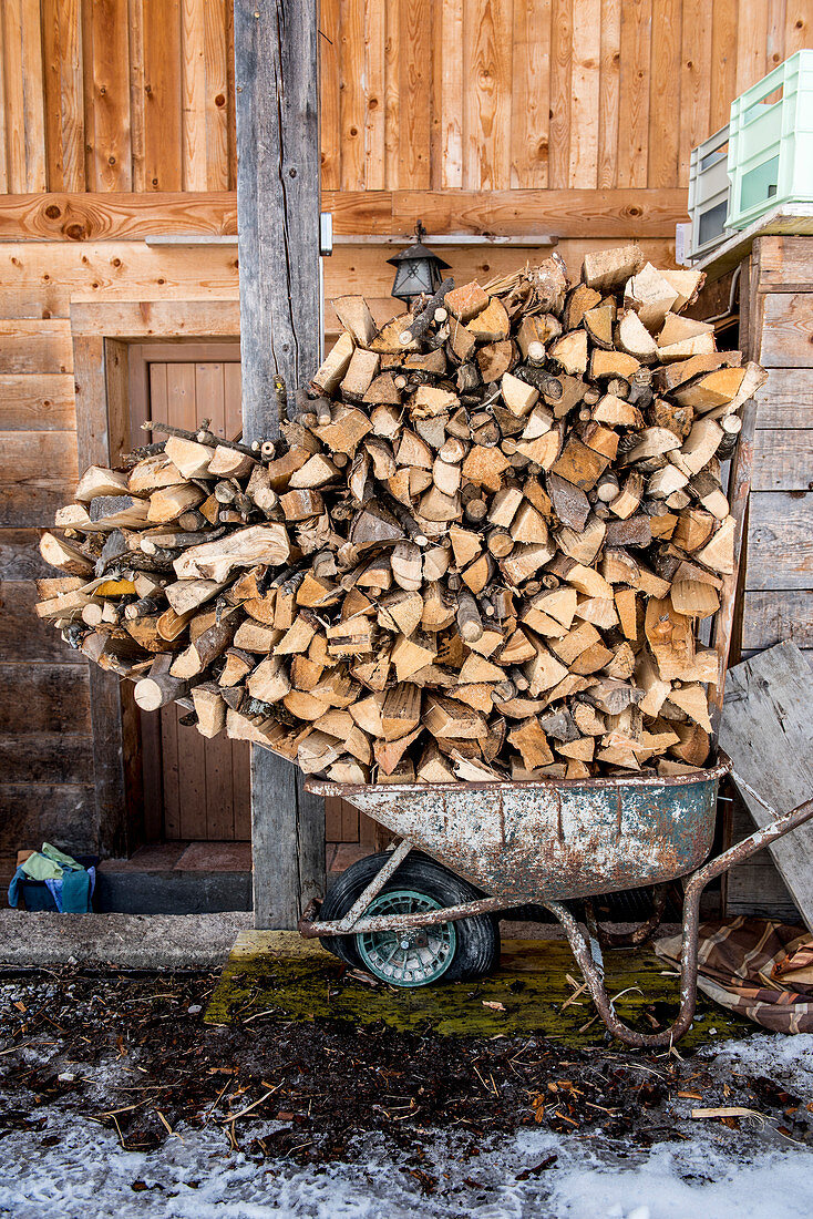 Firewood in a wheelbarrow, Pflerschtal, South Tyrol, Italy