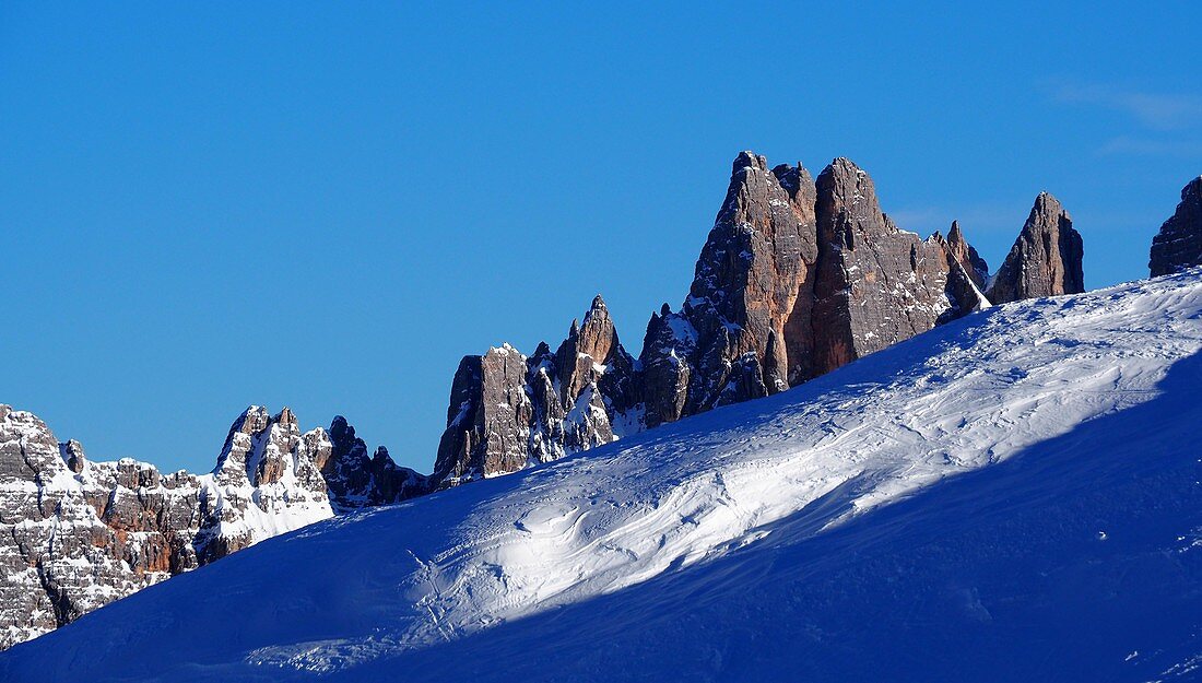 Hut in the ski area above Cortina d'Ampezzo, on the Cinque Torri, snow, dolomites, rocks, winter in Veneto, Italy