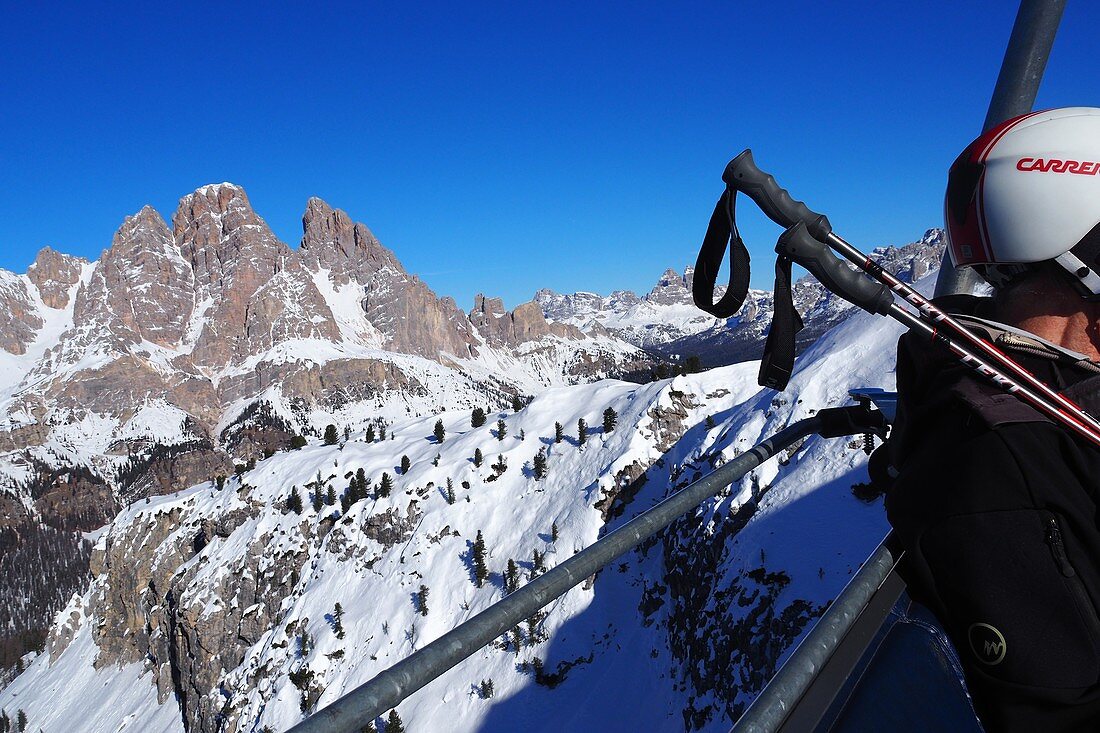 in the ski area under the Cristallo above Cortina d´Ampezzo, ski slope, snow, skier, chair lift, landscape, Dolomites, winter in Veneto, Italy