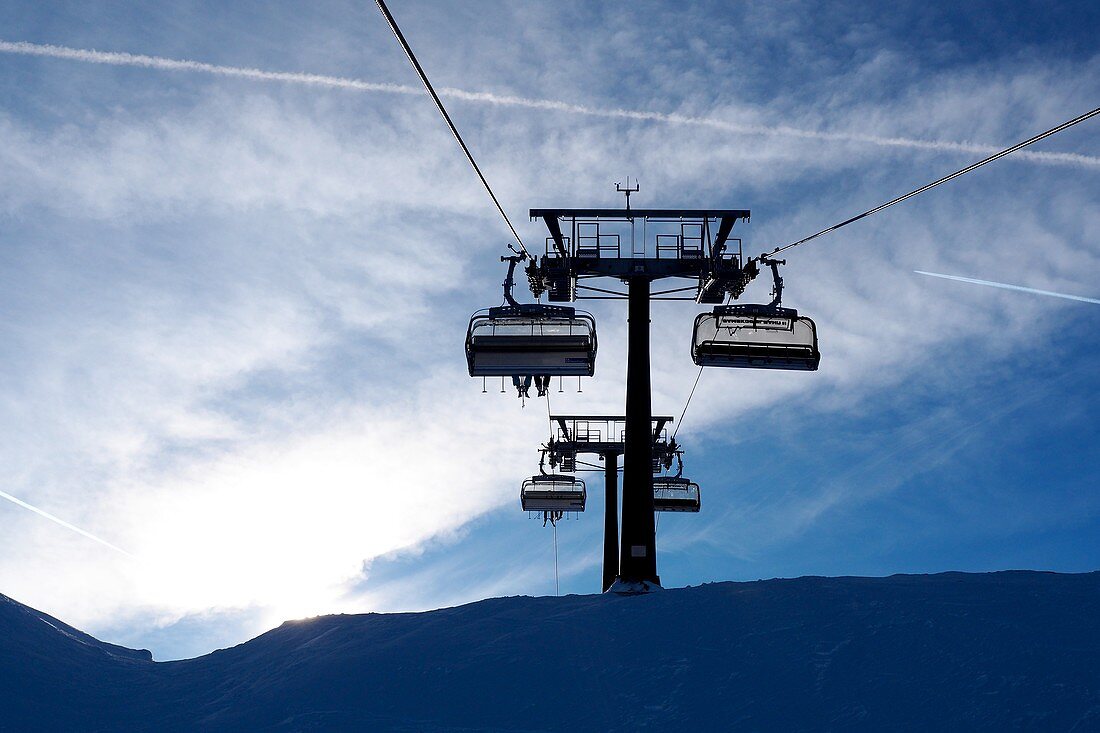 In the skiing area Zauchensee, Sportwelt Amadé, mountains, chairlift, clouds, sky, winter in Salzburg, Austria