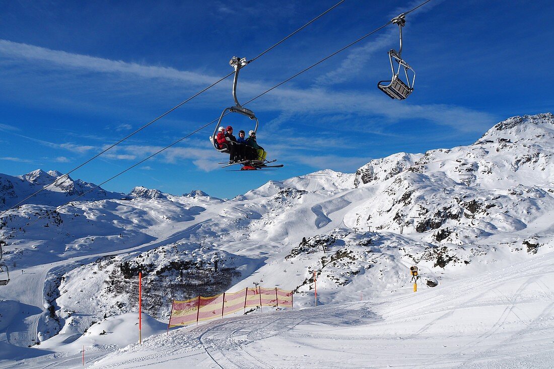 In Obertauern, ski area, pass, snow, sun, ski slopes, skiers, ski lifts, winter in Salzburg, Austria