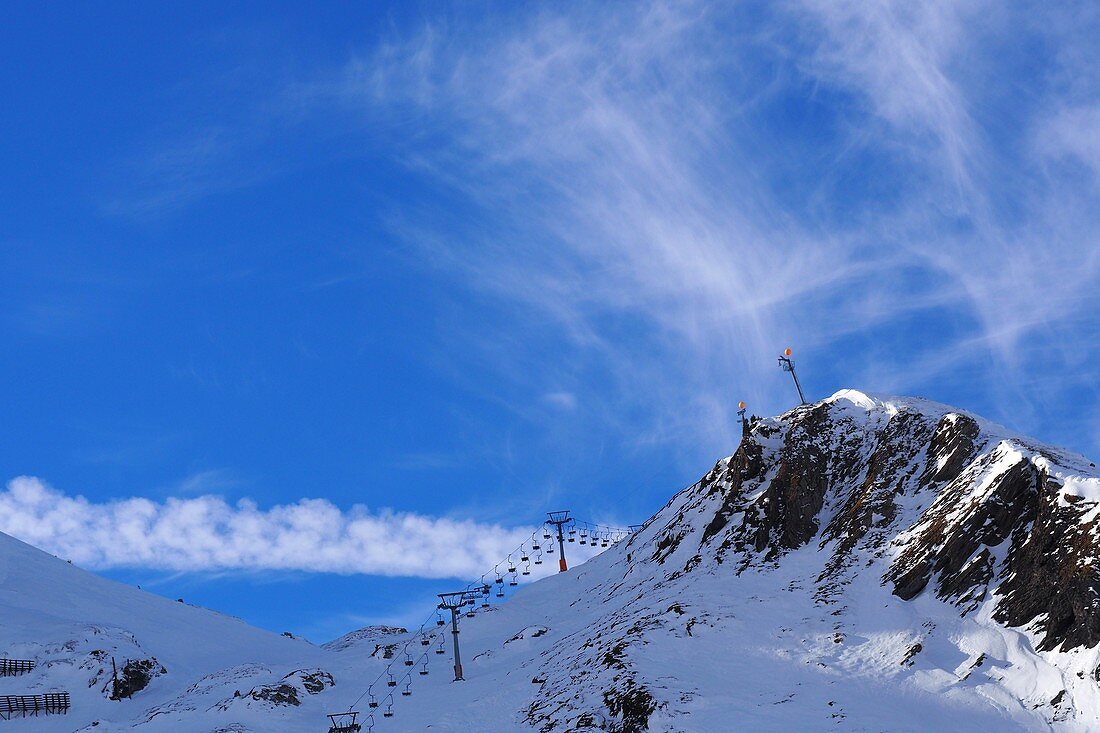 In the Obertauern ski area at Zehnerkar, snow, sky, ski lift, ski slope, clouds, Alps, winter in Salzburg, Austria