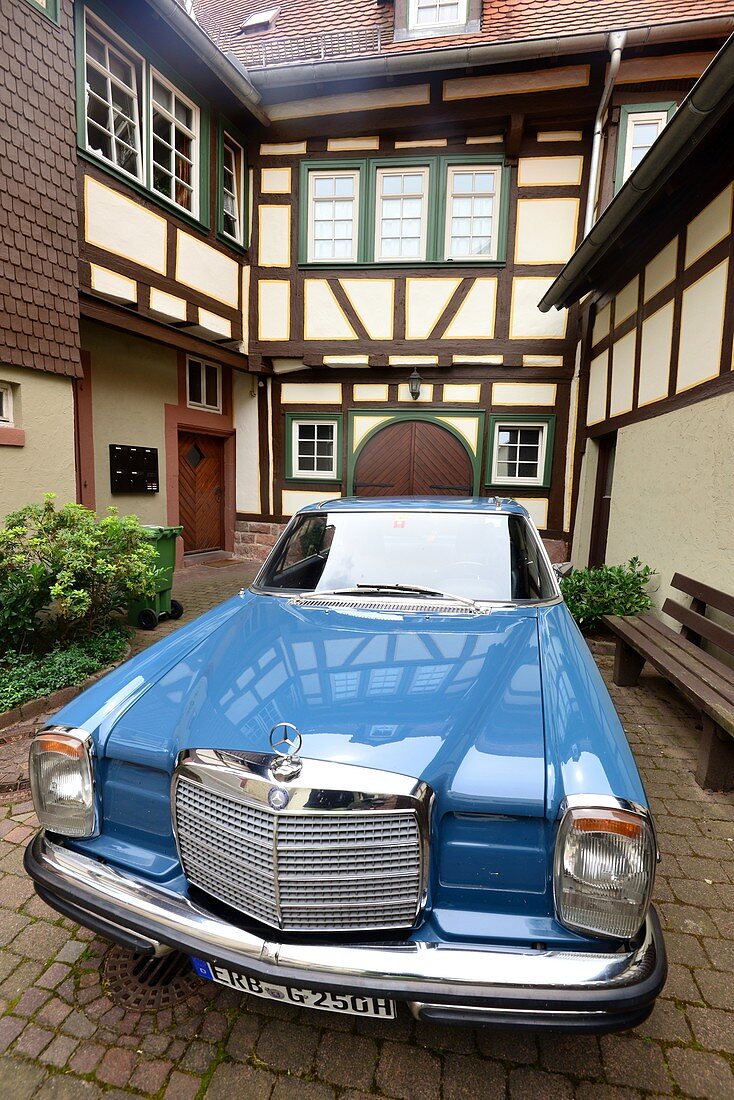 Michelstadt in the Odenwald, half-timbered house, old Mercedes, blue, oldtimer, Hesse, Germany