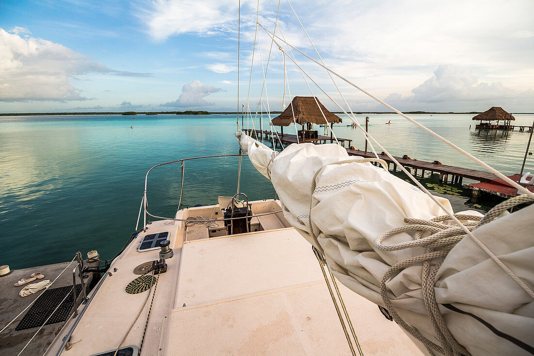 Sailboat on the bank of the Bacalar Lagoon, Quintana Roo, Yucatan Peninsula, Mexico