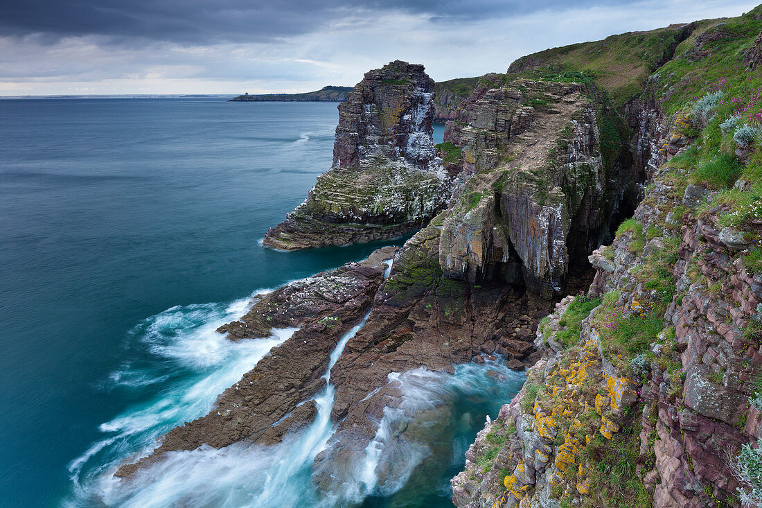 View of the bird rock, which is also a nature reserve, below the lighthouse at Cap Frehel.