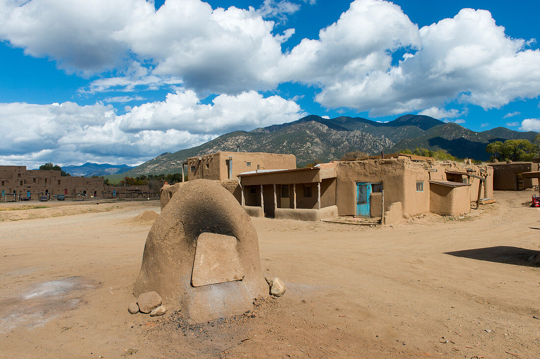 Oven used for cooking and baking at the Taos Pueblo which is the only living Native American community designated both a World Heritage Site by UNESCO and a National Historic Landmark in Taos, New Mexico, USA.