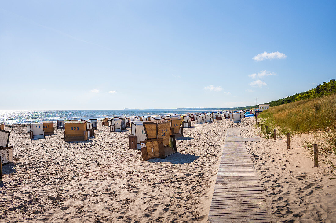 View of the beach in Karlshagen with chest baskets in the morning, Usedom, Mecklenburg-Western Pomerania, Germany