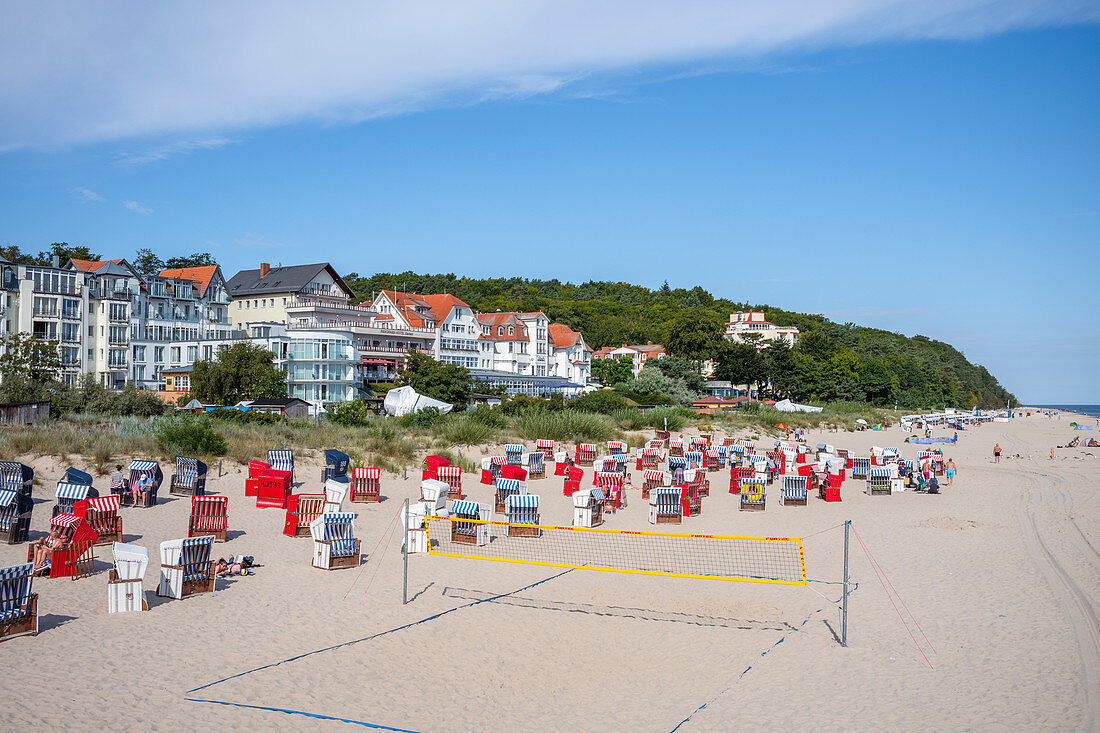 Beach in Bansin with beach chairs and volleyball net, summer sky vacationers, Usedom, Mecklenburg-Western Pomerania, Germany