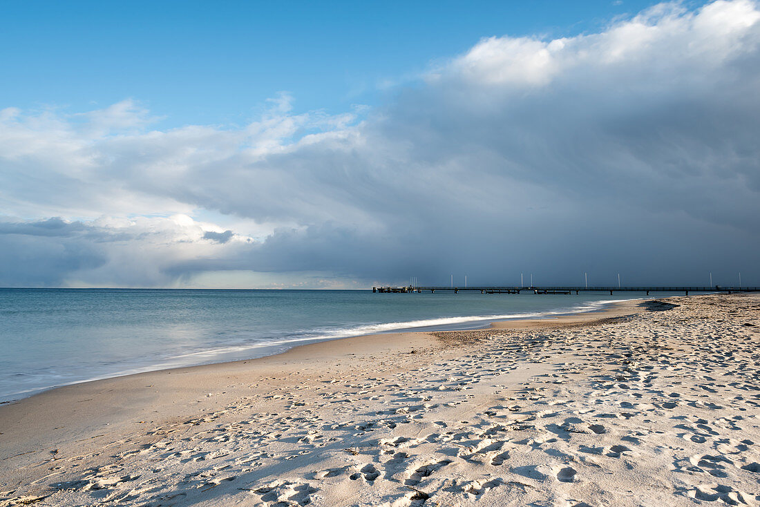 Approaching snow showers on Dahmer Strand, Baltic Sea, Schleswig-Holstein, Germany