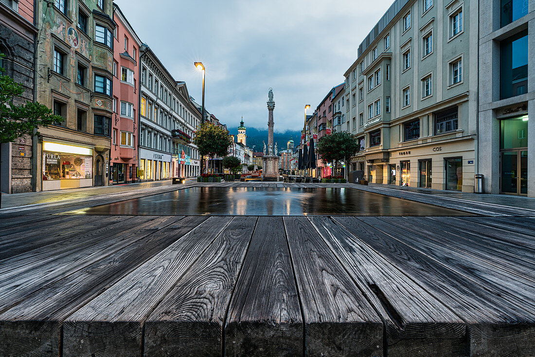 Early morning on Maria Theresien Strasse in cloudy Innsbruck, Tyrol, Austria