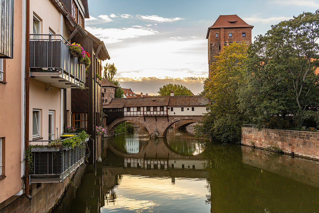 View from Flea Market Bridge to the Pegnitz (river) and the Henker's Bridge in the evening light, Nuremberg city center, Franconia, Bavaria, Germany