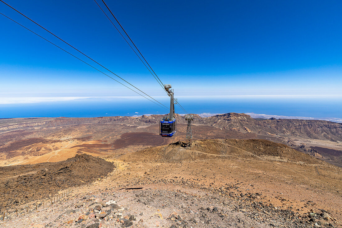 View from the summit of the Teide volcano (3,555 m) to the arriving gondola at the cable car mountain station, Tenerife, Spain