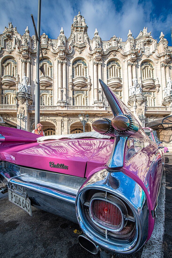 A vibrant classic pink Cadillac , Havana, Cuba