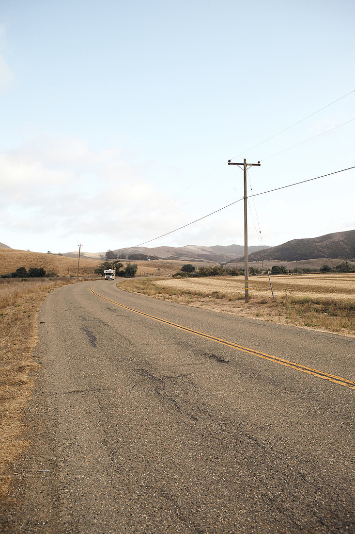 Road with RV on the way to Jalama Beach, California, USA.