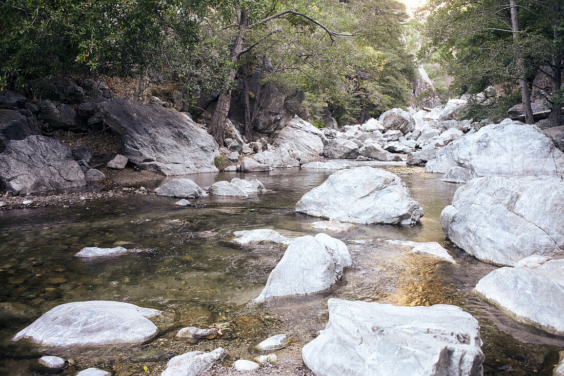 Stones and rock walls of the Big Sur River in Pfeiffer Big Sur State Park, California, USA.