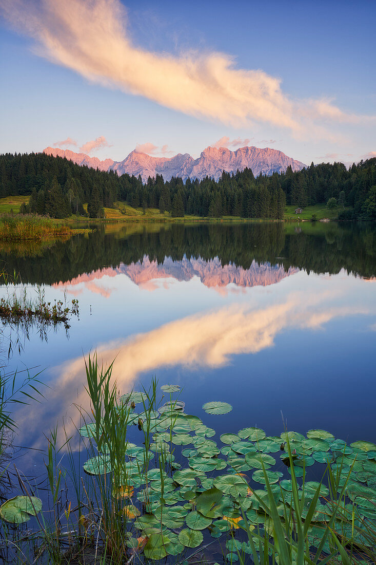 Sunset at Geroldsee with a view of the lake and the Karwendel massif, Bavaria, Germany.