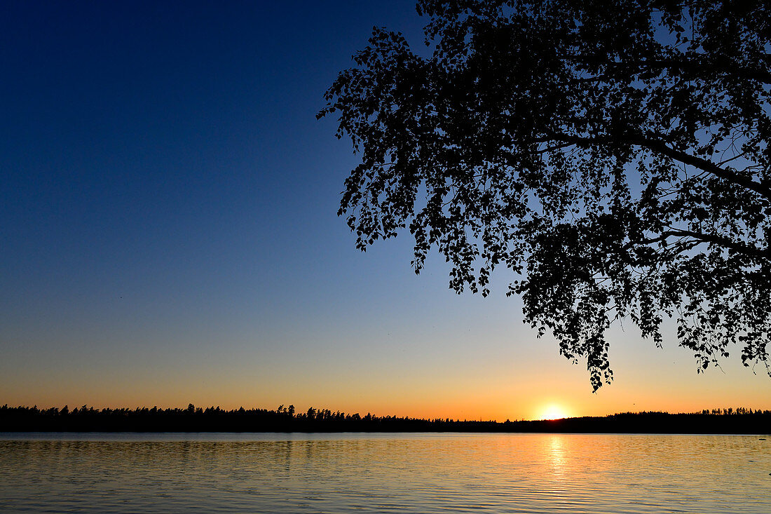 A wonderful sunset at the lonely lake near Rannebo, Sweden