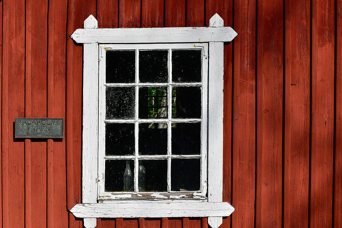 A window in a red Swedish house, Radaholmskvarn, Stengårdshult, Sweden