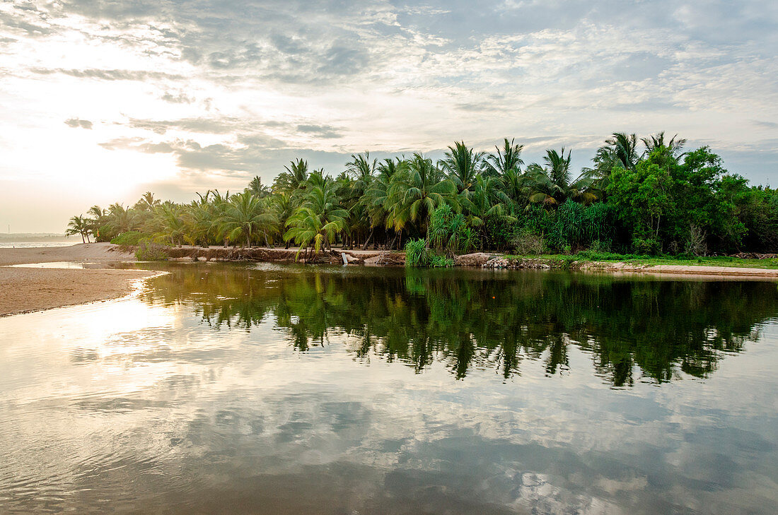 Tangalle, Hambantota District, Southern Province, Sri Lanka, Southern Asia. A small pond by Tangalle Beach.