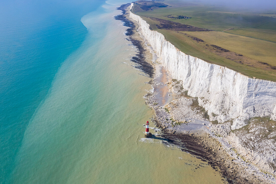 Aerial view of Beachy Head with it's Lighthouse, a chalk headland in East Sussex, England. It is situated close to Eastbourne, immediately east of the Seven Sisters. Southern England.