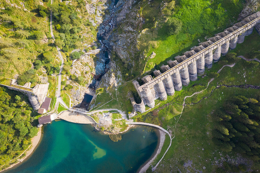 Aerial view of the ruins of the Diga del Gleno. Pianezza, Vilminore di Scalve, Scalve Valley, Lombardy, Bergamo province, Italy.