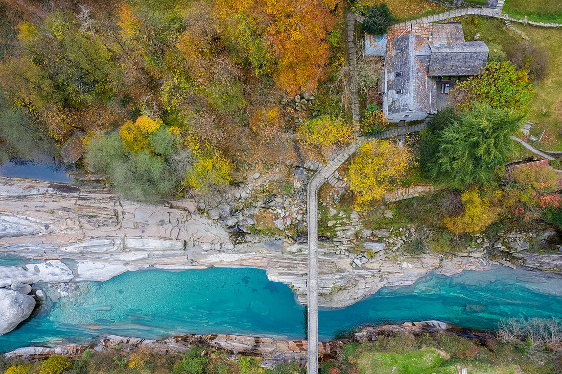 Aerial view of the "Ponte dei Salti", an old double arch stone bridge over river Verzasca in the town of Lavertezzo, Valle Verzasca, Canton Ticino, Switzerland.