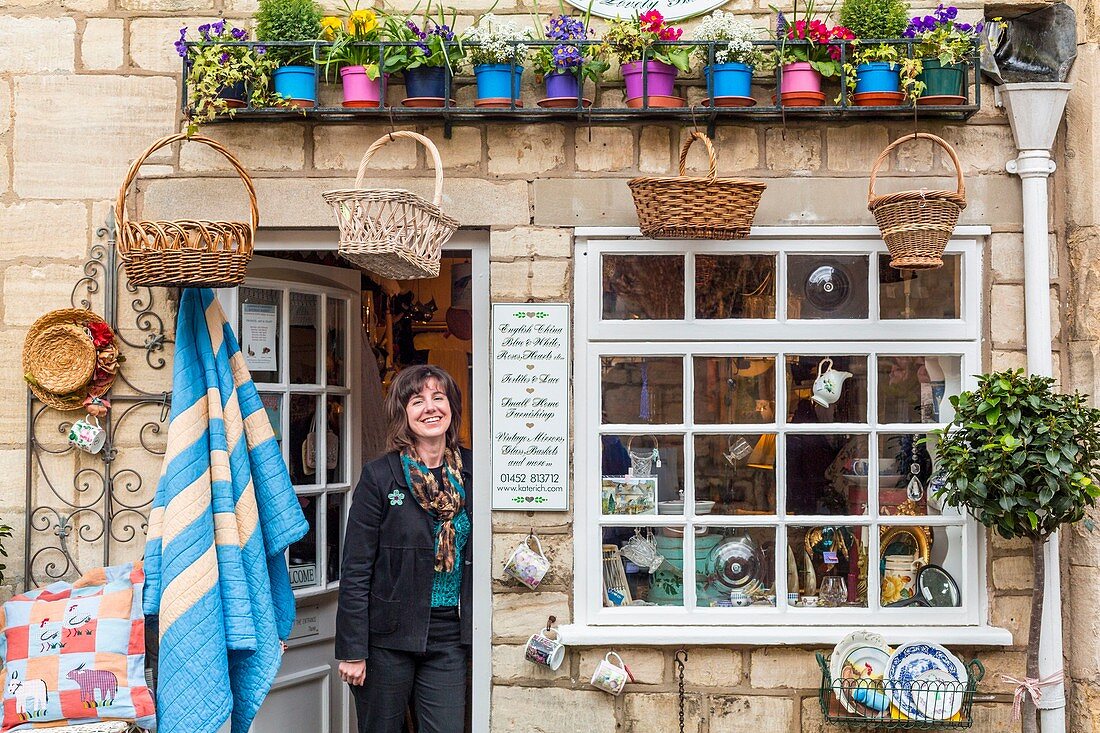 United Kingdom, Gloucestershire, Cotswold district, Cotswolds region, junk shop and souvenirs named Kate Rich and opened in 1981 with its owner on the doorstep